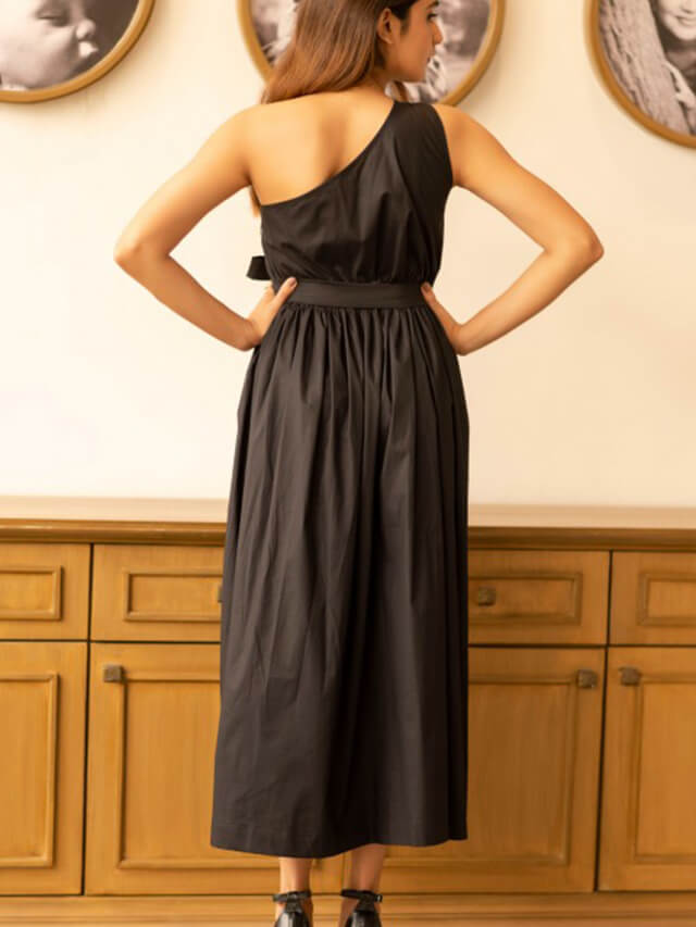 One side shoulder black assymetrical dress with a belt