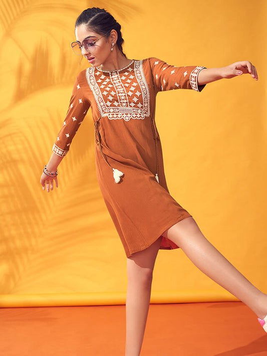 Rust coloured textured chiffon dress