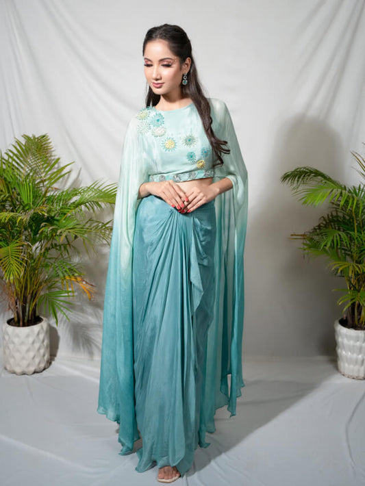 Ombre aqua green embellished wings top paired with drape skirt