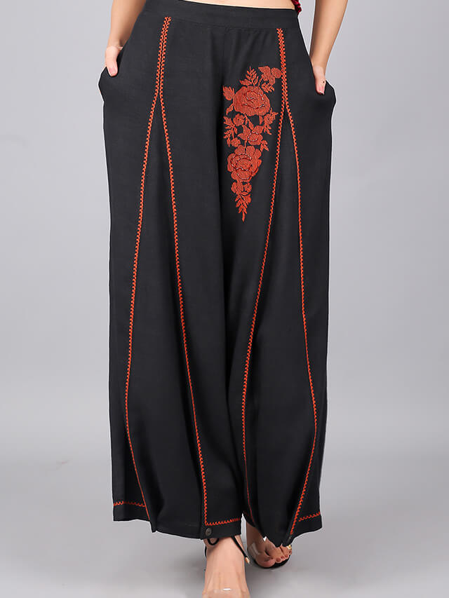 The single tone floral embroidery flex pants